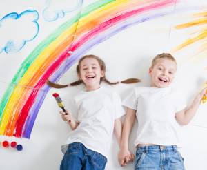kids painting rainbow